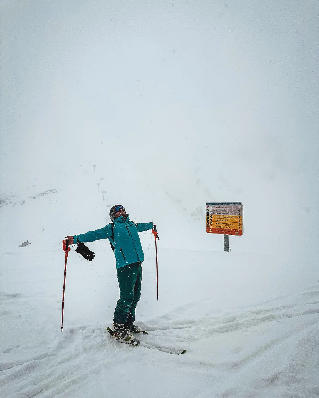 On the snow in Austria with my ski gear.