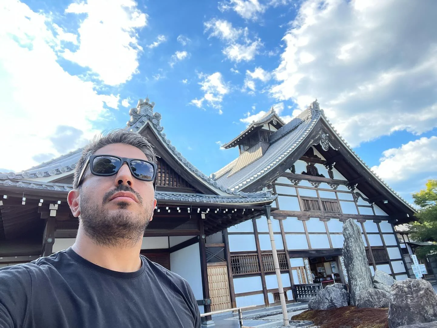 A photo of me in front of a traditional building on my trip to Japan.