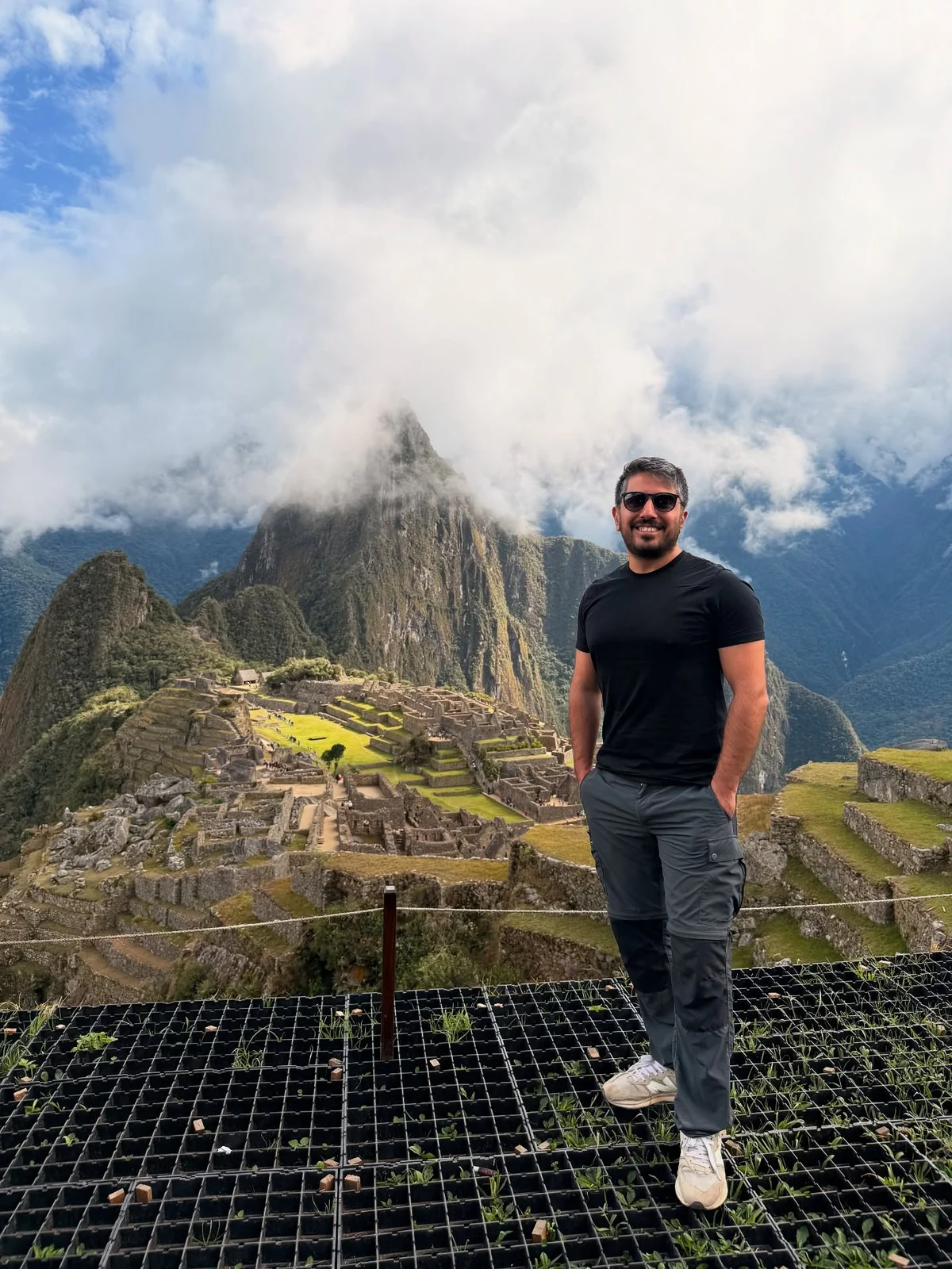 A photo of me in front of the mountains on my trip to Peru.