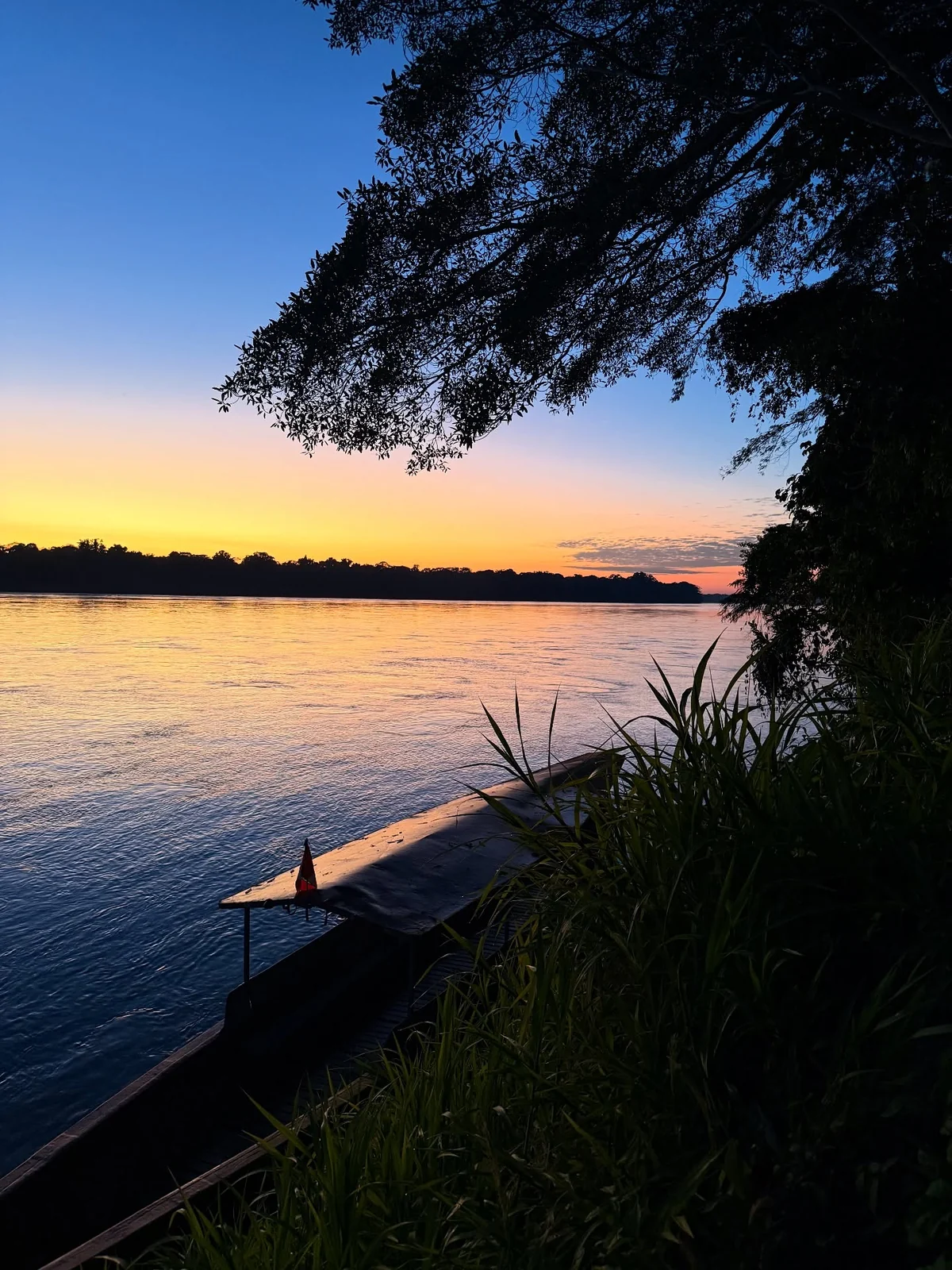 Sunset over a river from my trip to Peru.