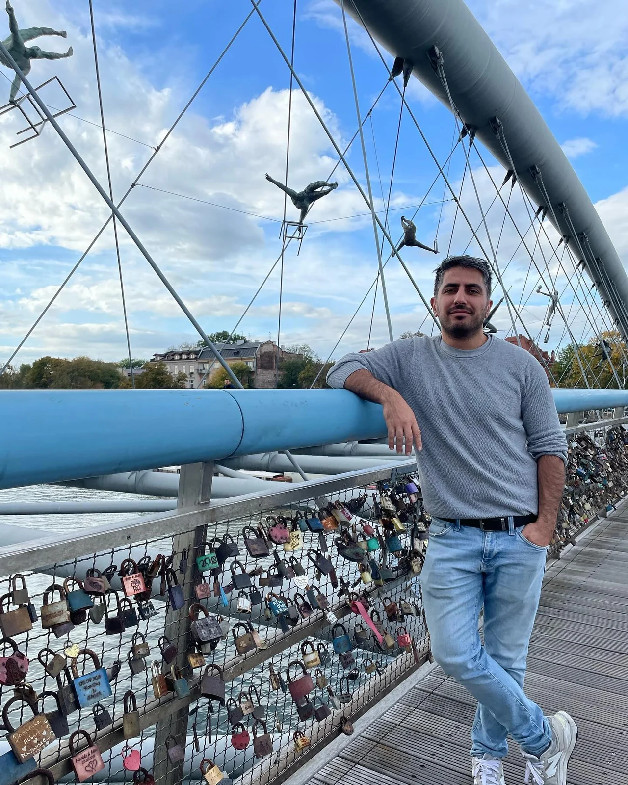 A photo of me in a glass-roofed building on my trip to Poland.
