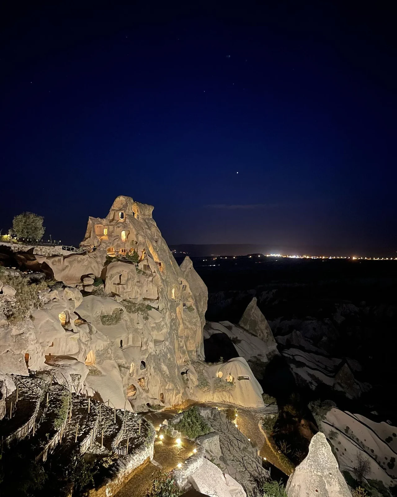 Rock formations lit up at night from my travels in Türkiye.